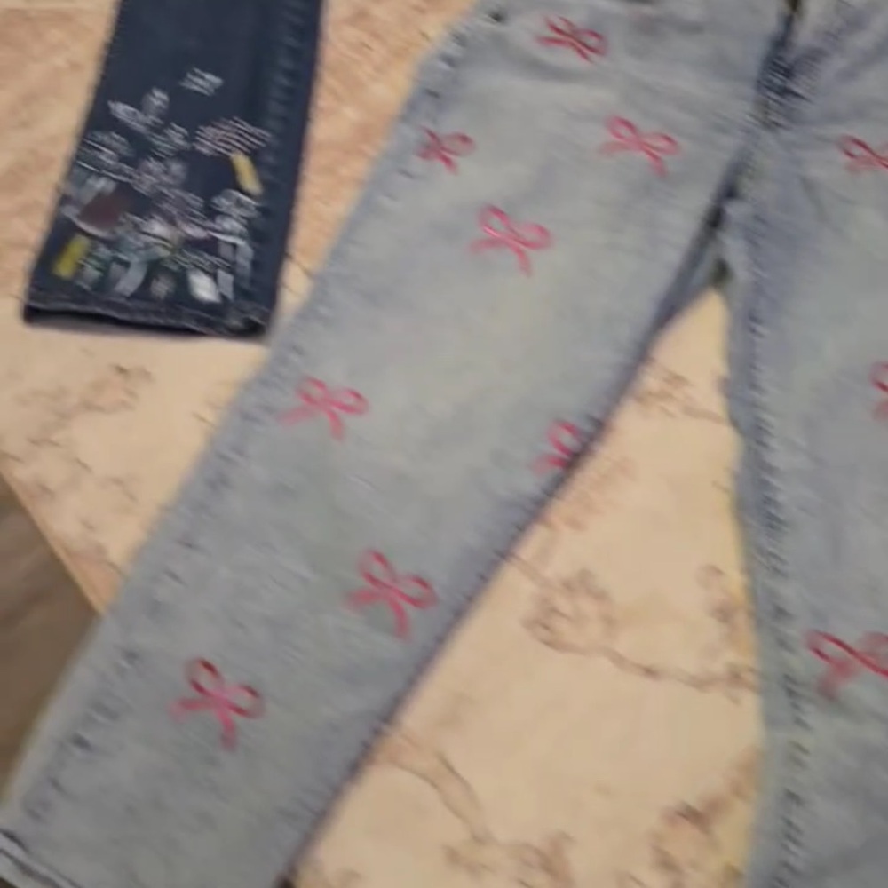 Chic Light Blue Jeans with Red Bow Details